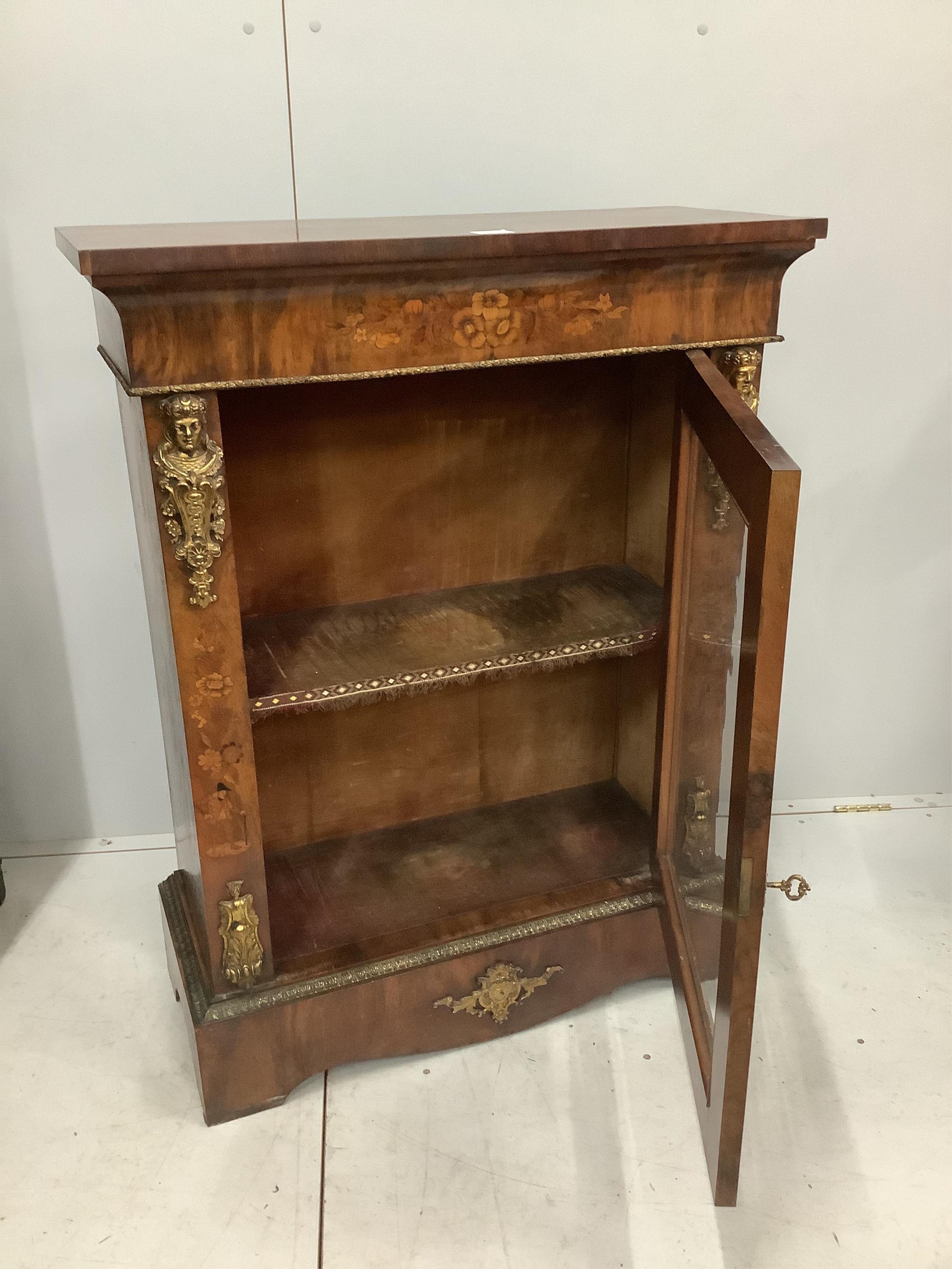 A Victorian walnut and floral marquetry inlaid gilt metal mounted pier cabinet, width 84cm, depth 34cm, height 110cm. Condition - fair